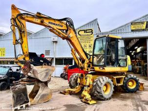 Pelle  Komatsu PW110R-1 PELLE A PNEUS 12T