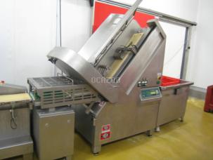 Trancheur TREIF type DIVIDER CE 1000 équipé d'une pesée CHECK-WEIGHER et d'un double convoyeur