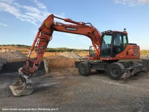 Pelle Doosan DX140 W
