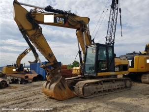 Pelle  Caterpillar 323 DL