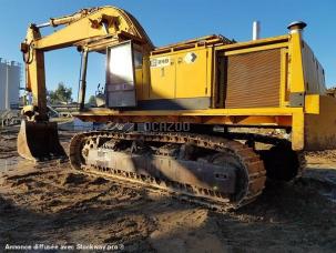 Pelle de manutention Caterpillar 245B