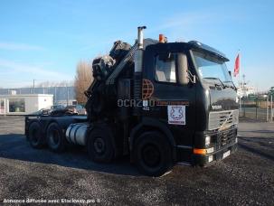 Tombereau rigide Volvo FH84T42T 8X4 with Fassi 80T/M Crane