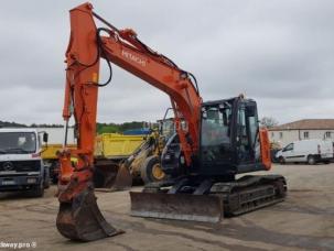 Pelle  Hitachi ZX135US