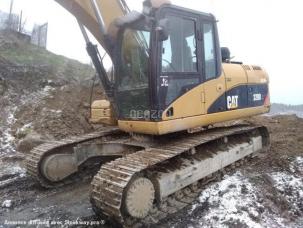 Pelle  Caterpillar 320DL