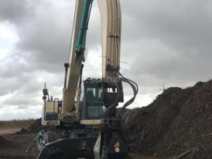 Pelle de manutention Doosan DX 210 WMH